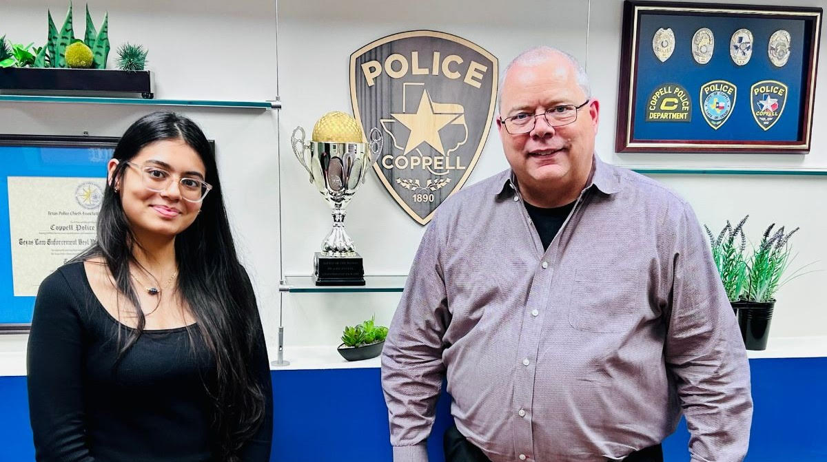 Charvi and the Chief reviewing TexAi on a device